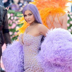 Kyle Jenner wearing a purple feathery Versace outfit on the 2019 Met Gala Red Carpet