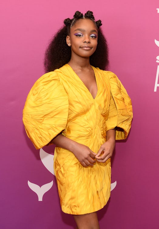 Marsai Martin in a yellow dress with bantu knots & loose curls hairstyle