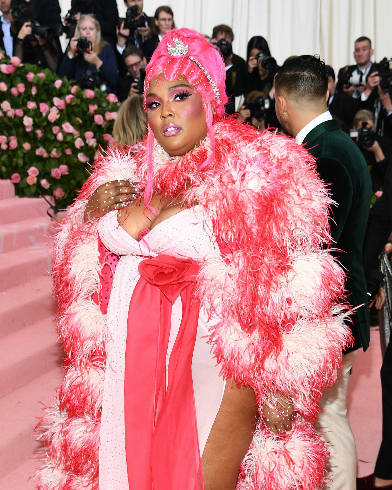 Lizzo Wore Her Met Gala Coat Through The Airport & It's A Total Boss