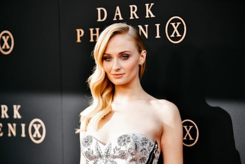 Sophie Turner in a floral dress and a side-part hairstyle at the Dark Phoenix premiere