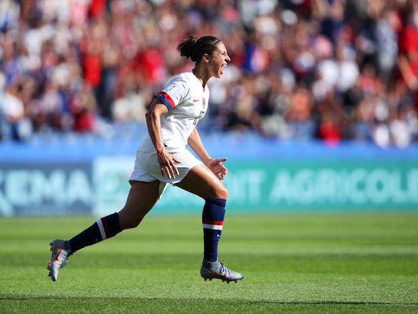 Female soccer player celebrating a goal