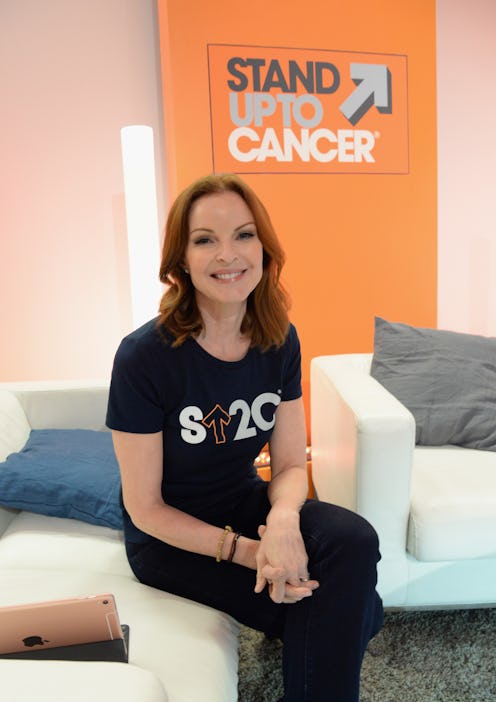 American actress Maria Cross in a black stand up to cancer shirt