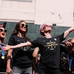 The USWNT players at the World Cup celebration parade