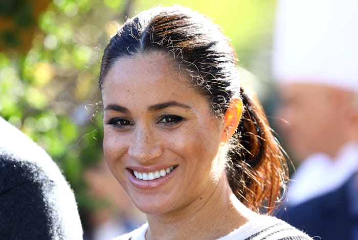 Meghan Markle showing of her freckles and natural beauty with minimal make up on