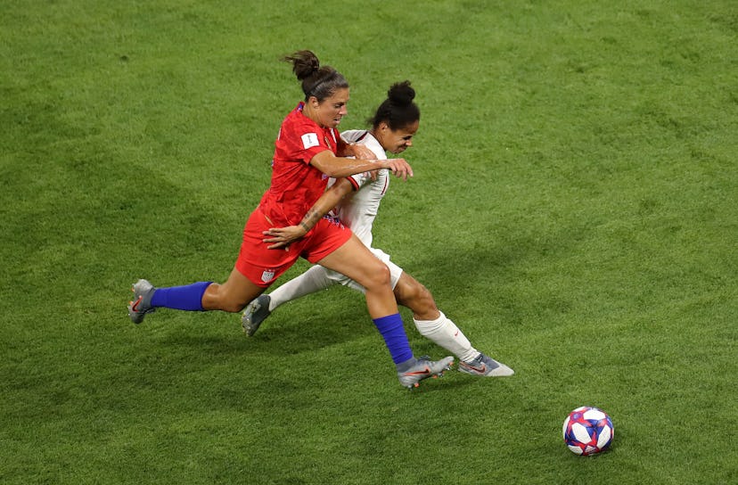 Two players in a tackle during the England versus USA match