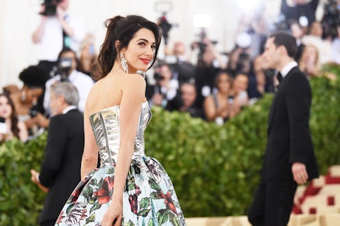 Amal Clooney wearing a red lipstick