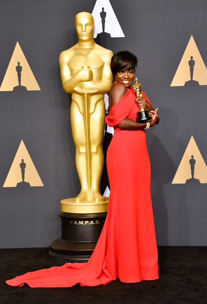 Viola Davis wearing a red gown at the 2017 Academy Awards