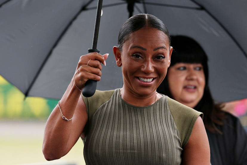 NORTHAMPTON, ENGLAND - JULY 14: Mel B walks in the Paddock before the F1 Grand Prix of Great Britain...