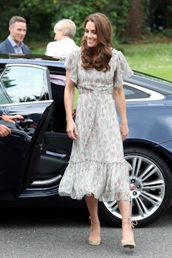 KINGSTON, ENGLAND - JUNE 25: Catherine, Duchess of Cambridge joins a photography workshop for Action...