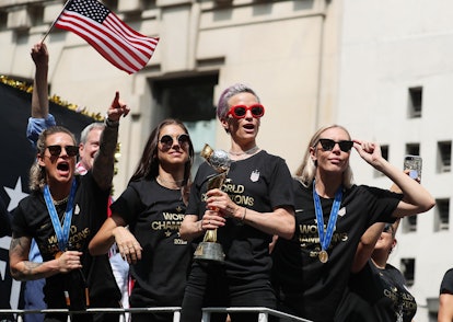 Megan Rapinoe celebrating the title with the rest of the U.S. Women's National Soccer team 