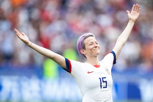 Megan Rapinoe's outstretched arms and tilted-back head celebratory power pose for which she is being...