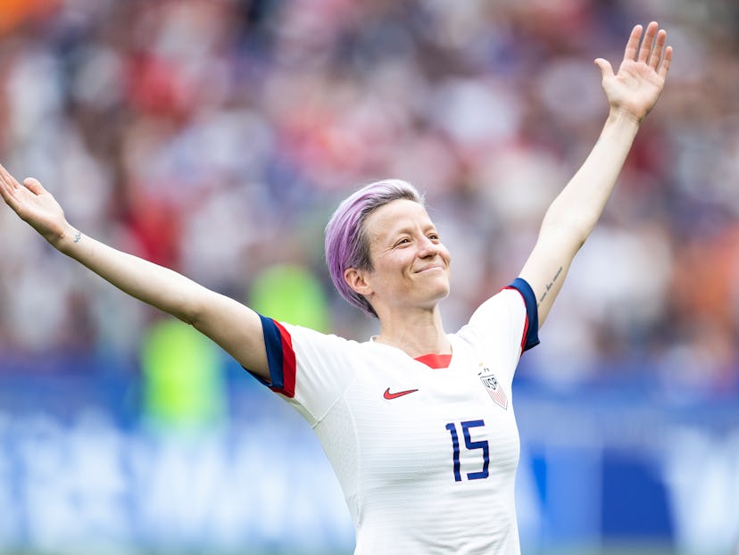 Megan Rapinoe's outstretched arms and tilted-back head celebratory power pose for which she is being...