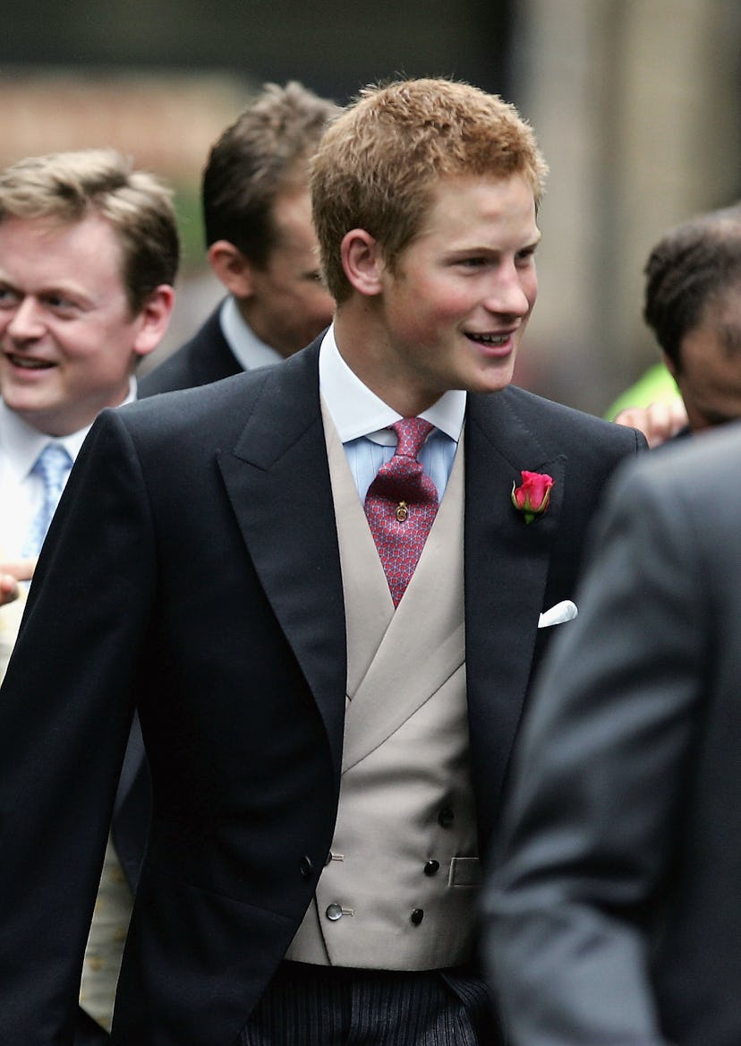 Prince Harry smiled at a family wedding in 1999.