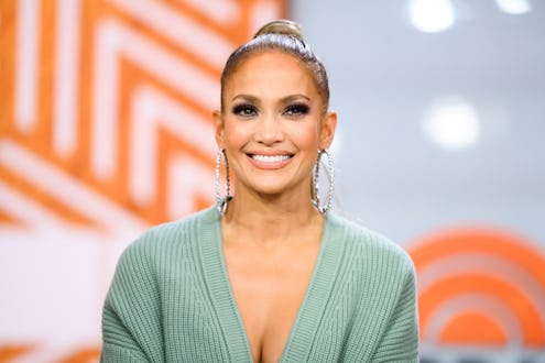Jennifer Lopez smiling with her well cared face skin as the highlight