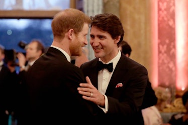 Prince Harry and Justin Trudeau catch up at an event.