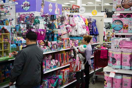 people shopping in the toy section of target