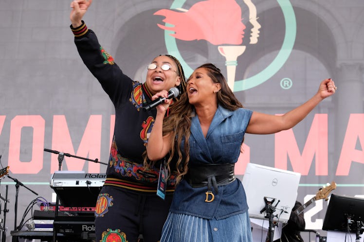 Raven Symone and Adrienne Bailon perform at the Women's March