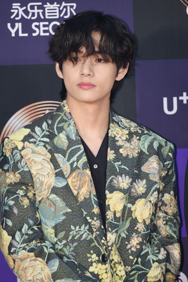 V from BTS hits the red carpet in a floral blazer.