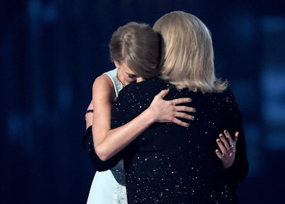 Taylor Swift hugs her mom, Andrea Swift, on-stage. 