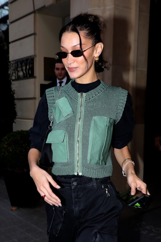 Bella Hadid's '90s updo and streetwear style.