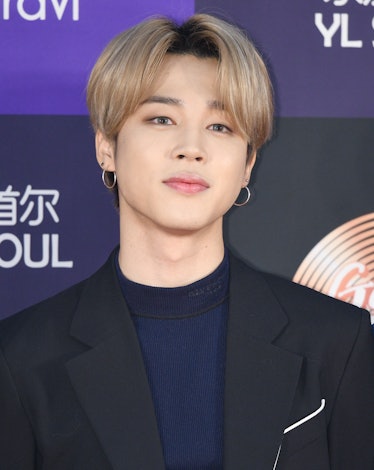 Jimin hits the red carpet in a black suit.
