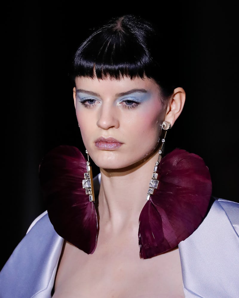 Baby bangs trend seen at Valentino Spring 2020 Couture show.