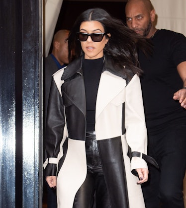 Kourtney Kardashian steps out in a black and white jacket.