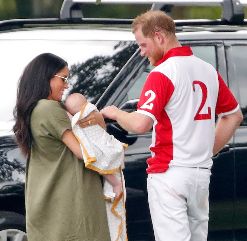 Meghan Markle and Prince Harry fuss over baby Archie. 