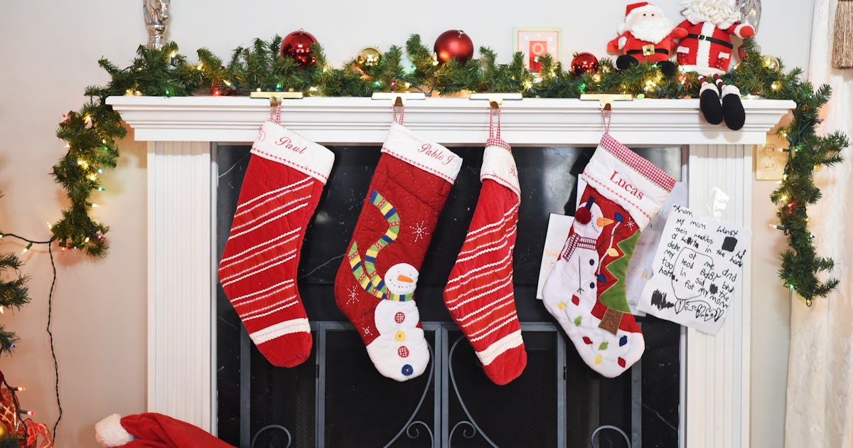 Why Do We Hang Stockings At Christmas This Holiday Tradition s Origins why-do-we-hang-stockings-at-christmas-this-holiday-tradition-s-origins