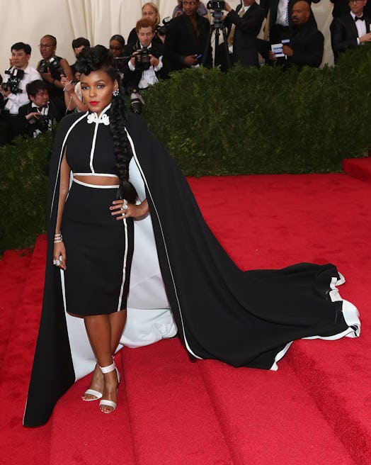 Janelle Monae wearing a cape