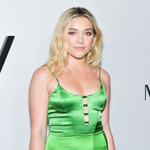 Florence Pugh's updo at the Oscars Nominees Luncheon is a modern twist on the classic red carpet sty...