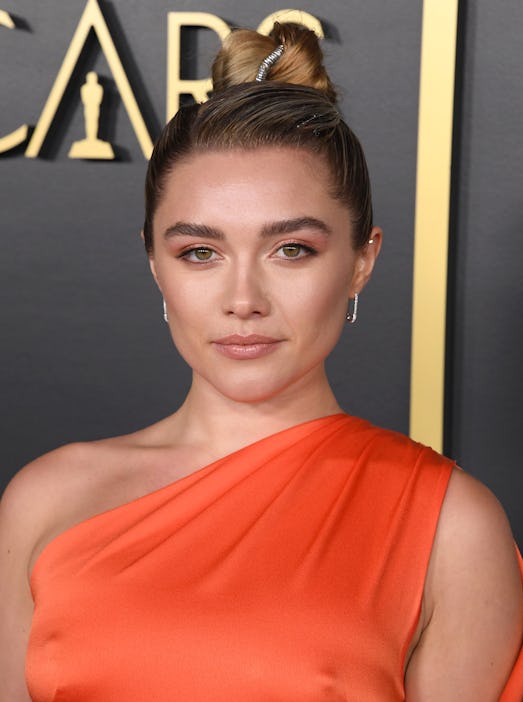 Florence Pugh's updo at the Oscars Nominees Luncheon was ultra-modern, and perfectly complemented he...