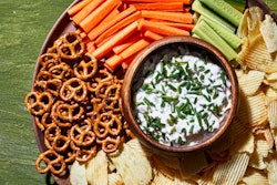 a plate of chips, veggies, pretzels and dip for super bowl from walmart