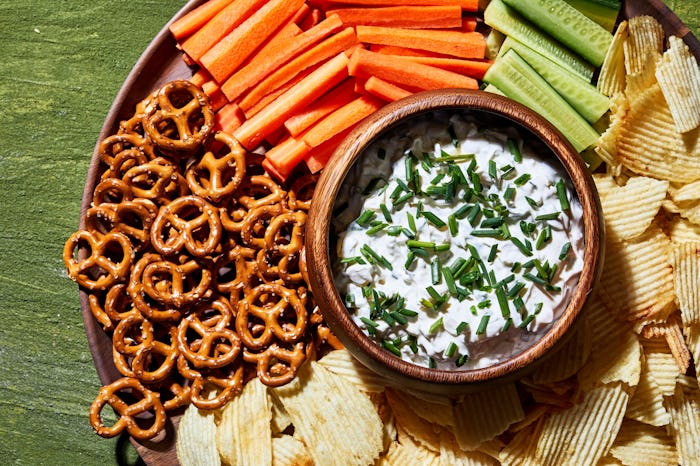 a plate of chips, veggies, pretzels and dip for super bowl from walmart