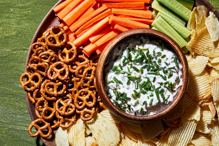 a plate of chips, veggies, pretzels and dip for super bowl from walmart