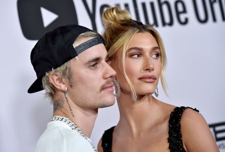 Justin Bieber and his wife Hailey posing at the premiere of his YouTube docu-series