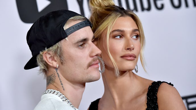 Justin Bieber and his wife Hailey posing at the premiere of his YouTube docu-series