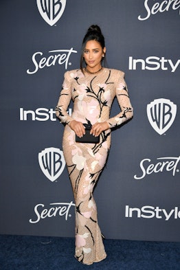 Shay Mitchell's Golden Globes dress was a nude illusion design.