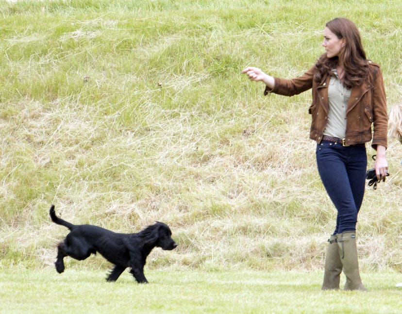Middleton plays with her dog Lupo