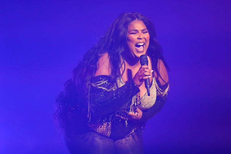 Lizzo belts out a tune live in concert.