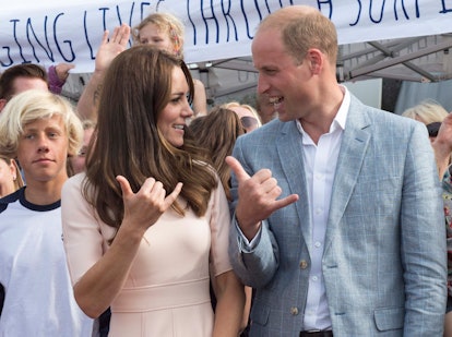 Middleton and Prince William throw up "aloha" symbols at the beach