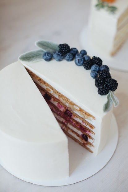 A delicious multi-layered carrot cake with fruit on top. Excluding whole food groups and types becau...
