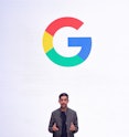 Google CEO Sundar Pichai in front of the Google "G" letter.