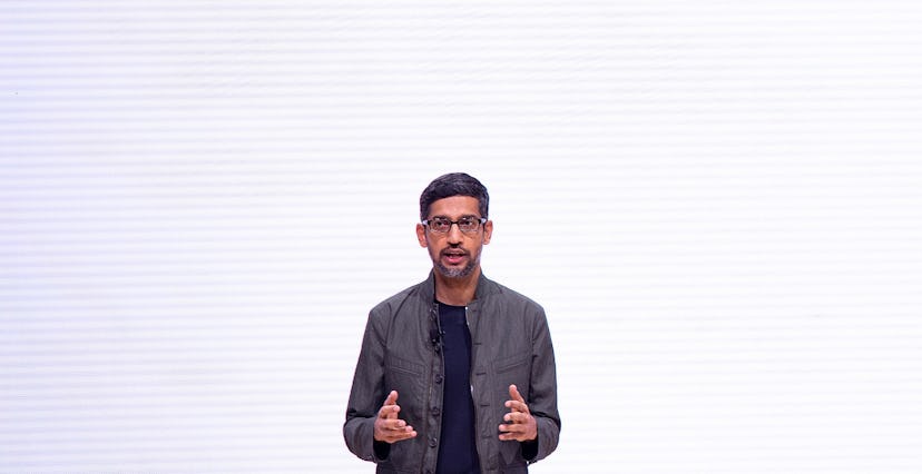 Google CEO Sundar Pichai in front of the Google "G" letter.