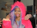 Nicki Minaj steps out in a colorful outfit.
