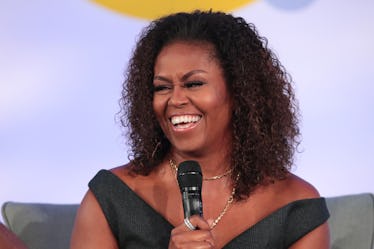 Michelle Obama speaks to a live audience.