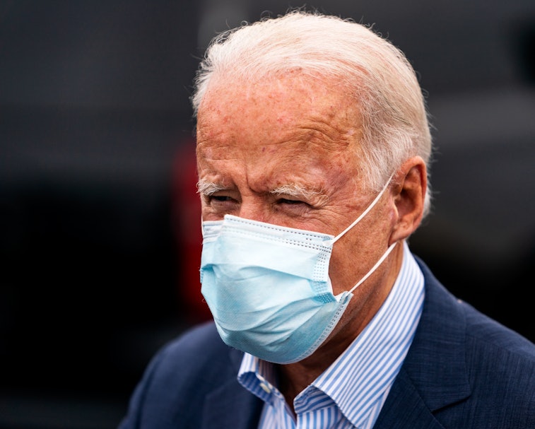 Former vice president of the United States Joe Biden can be seen in a face mask.
