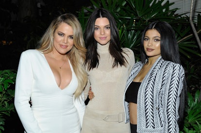Khloe Kardashian, Kylie Jenner, and Kendall Jenner pose for a photo.