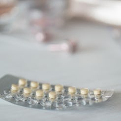 A half empty birth control pill pack on a marble table. Doctors debunk myths about birth control and...
