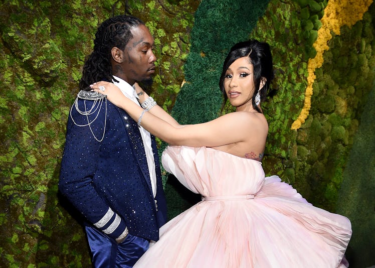 Cardi B and Offset posing for a photo at their wedding